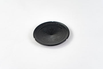 Black BudCups bottom insert with BudTrainer logo and drainage spike for healthy cannabis root growth.