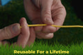 Hands holding flexible yellow BudHuggers training wire, emphasizing durability and reusability for a lifetime.