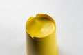 Yellow BudCups bottom insert fitted inside BudTrainer cup for superior cannabis drainage and root aeration.