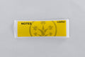 BudTrainer branded yellow sticky notes for cannabis grower reminders and plant tracking.
